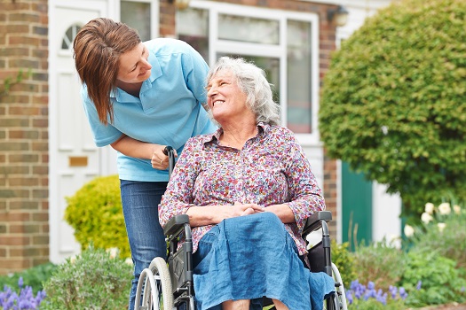 1 Caregiver-Helping-a-Senior-Woman Complete Relocation Solutions Indianapolis